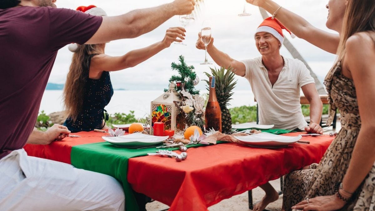Australian family having a Christmas barbecue at the beach