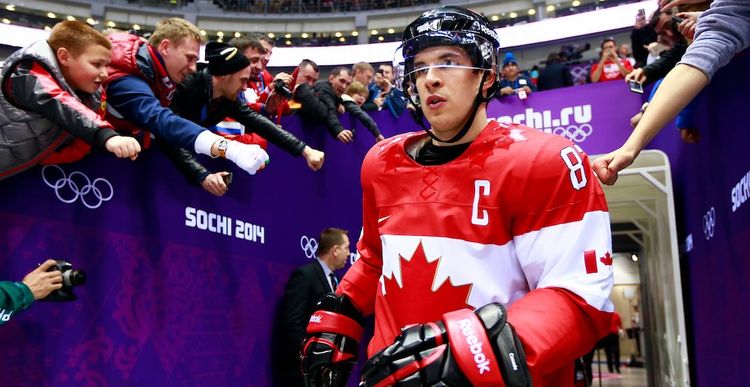USA men's hockey team celebrating victory at 2026 Winter Olympics
