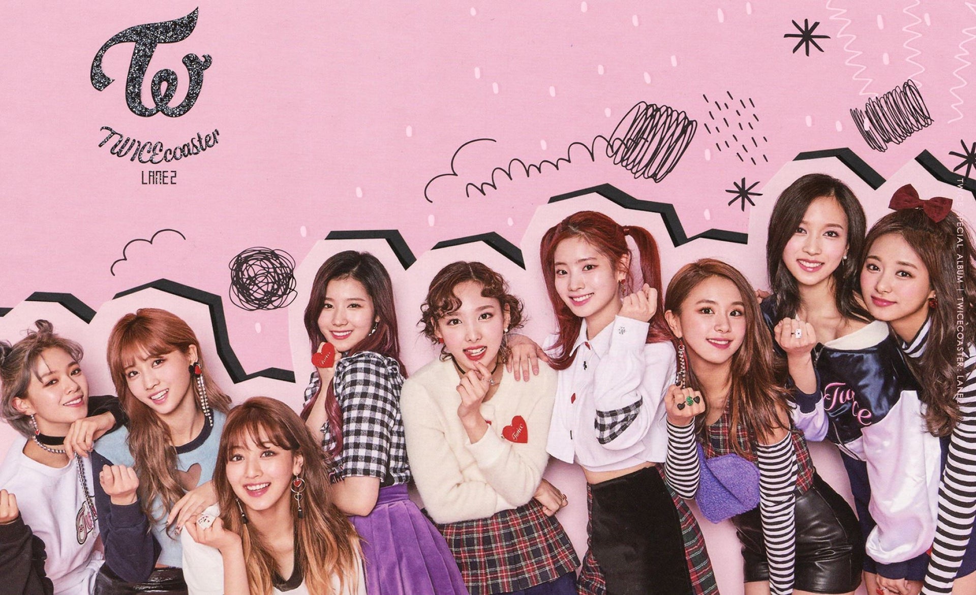 Le groupe K-pop TWICE sur scène, interprétant une chorégraphie énergique