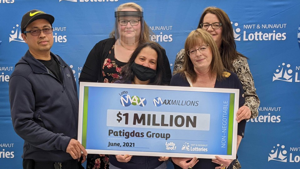 A close-up of a Lotto Max ticket showing winning numbers, symbolizing a $75 million prize