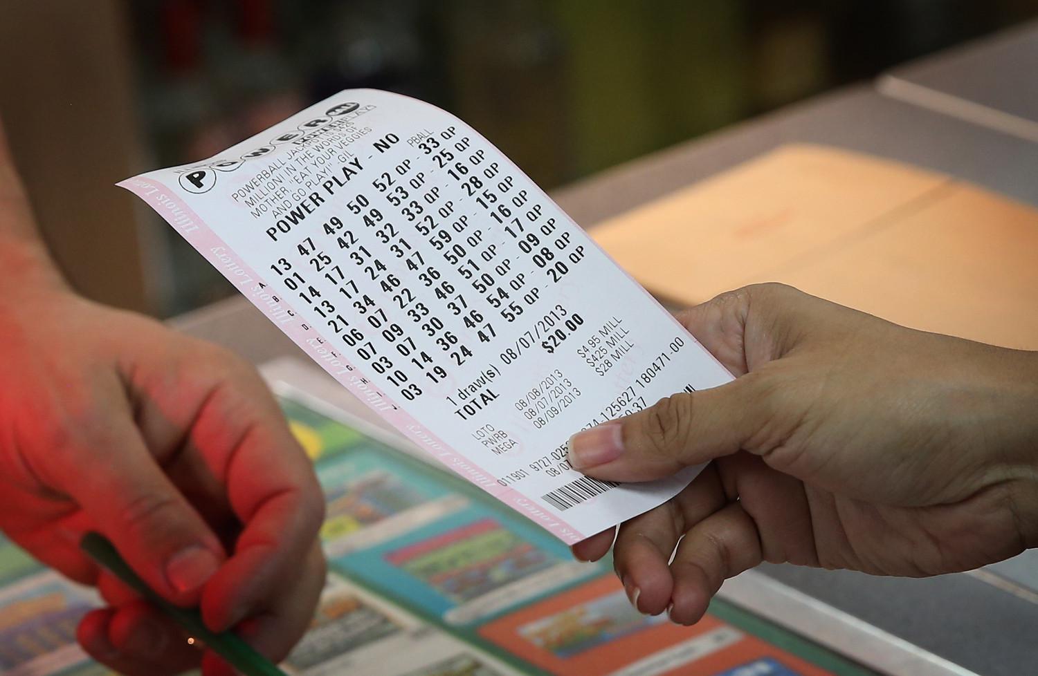 Australians checking Powerball tickets after a draw